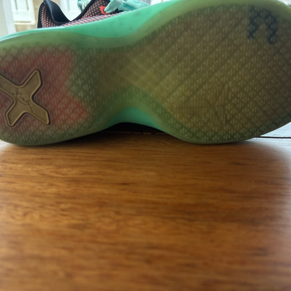 Green and Black Athletic Shoes with Textured Sole and Traction